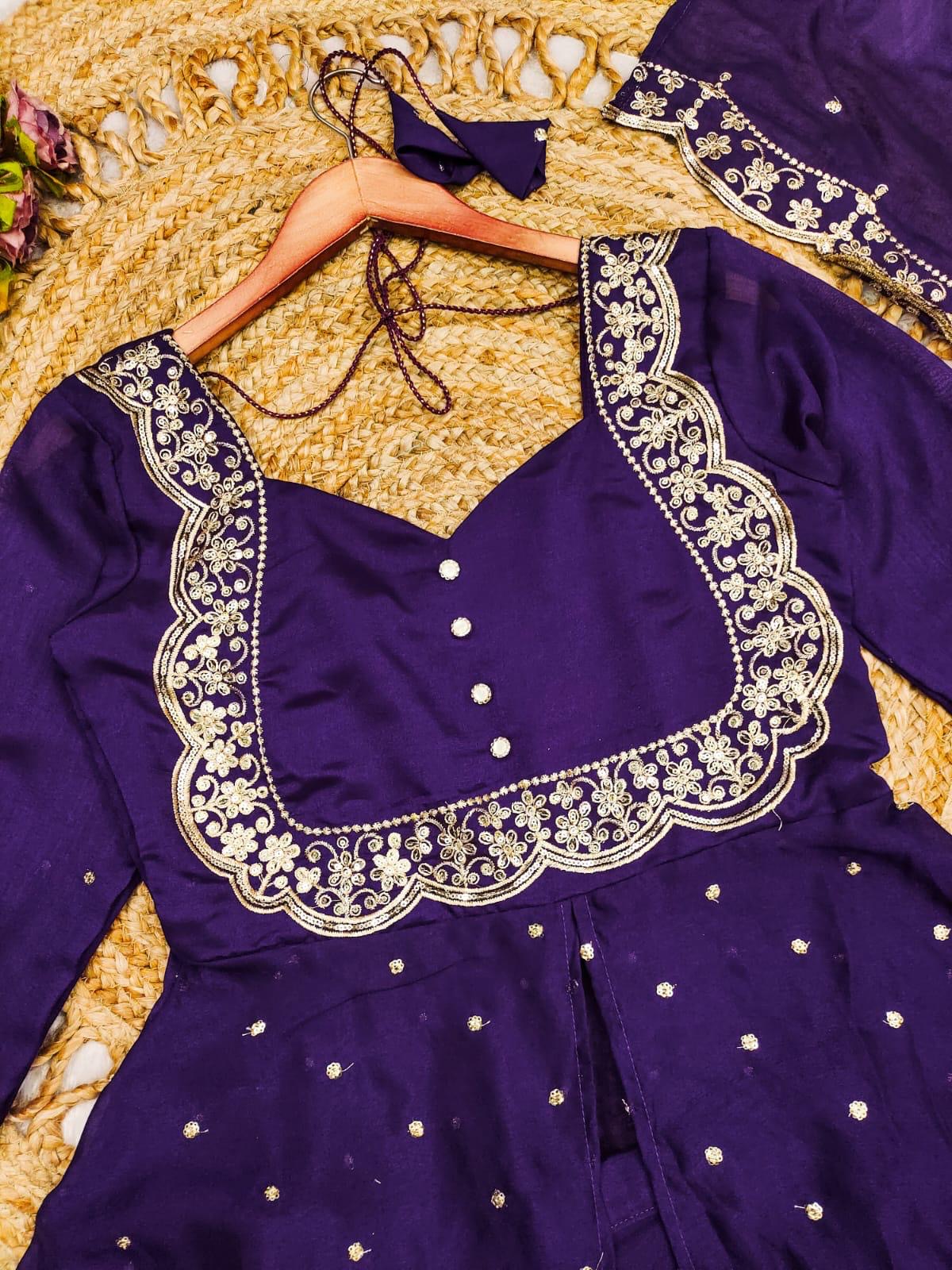Vedhika purple suit