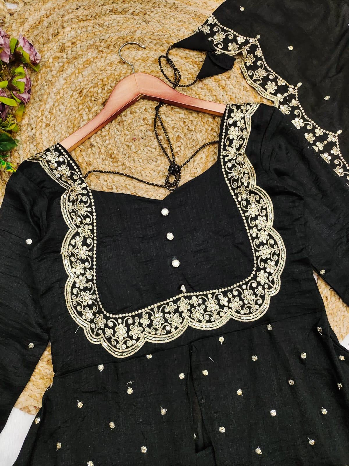 Vedhika black suit
