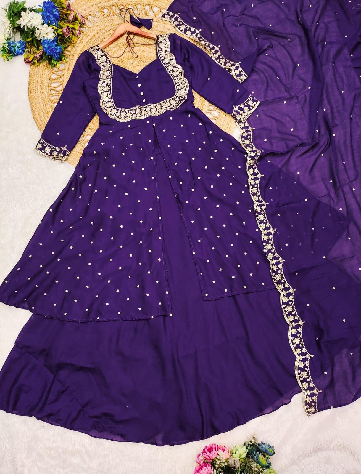Vedhika purple suit